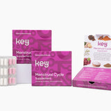 The image shows a supplement product for Key Menstrual Cycle, with packaging that includes a box and a blister pack with tablets.