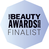 Hexagonal badge with 'Pure Beauty Awards 2025 Finalist' text on a light blue background