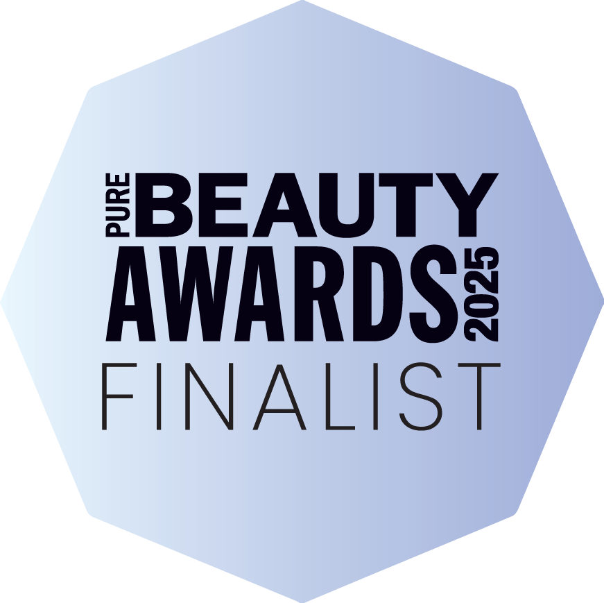 Hexagonal badge with 'Pure Beauty Awards 2025 Finalist' text on a light blue background